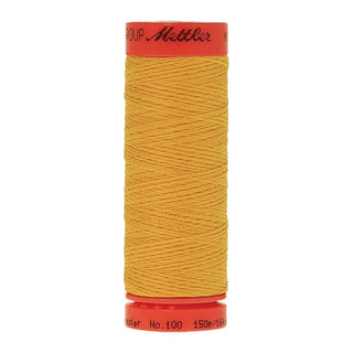 Mettler Metrosene 100% Polyester Cotton #0607 Papaya from Gabriele's Sewing & Crafts is a durable fine sewing thread that sews delicate silks to tough denim.