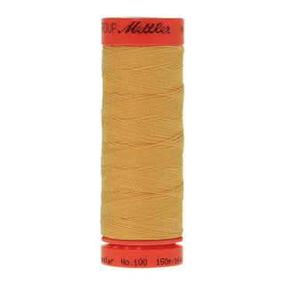 Mettler Metrosene 100% Polyester Cotton #0891 Candlelight from Gabriele's Sewing & Crafts is a durable fine sewing thread that sews delicate silks to tough denim.