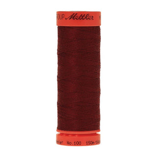 Mettler Metrosene 100% Polyester Cotton #0918 Cranberry from Gabriele's Sewing & Crafts is a durable fine sewing thread that sews delicate silks to tough denim.