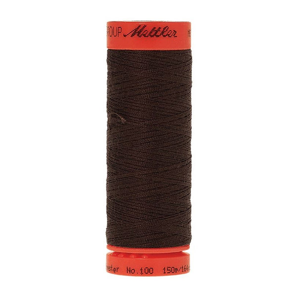 Mettler Metrosene 100% Polyester Cotton #1002 Very Dark Brown from Gabriele's Sewing & Crafts is a durable fine sewing thread that sews delicate silks to tough denim.