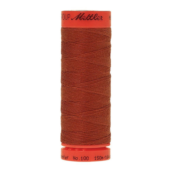Mettler Metrosene 100% Polyester Cotton #1054 Brick Red from Gabriele's Sewing & Crafts is a durable fine sewing thread that sews delicate silks to tough denim.