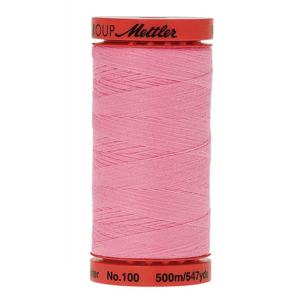 Mettler Metrosene 100% Polyester Cotton #1056 Petal Pink from Gabriele's Sewing & Crafts is a durable fine sewing thread that sews delicate silks to tough denim.