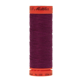 Mettler Metrosene 100% Polyester Cotton #1062 Purple Passion from Gabriele's Sewing & Crafts is a durable fine sewing thread that sews delicate silks to tough denim.