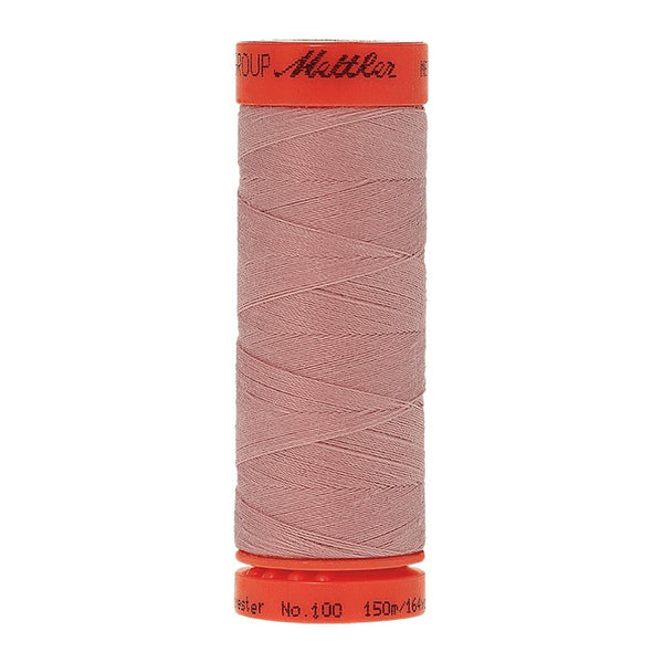 Mettler Metrosene 100% Polyester Cotton #1063 Tea Rose from Gabriele's Sewing & Crafts is a durable fine sewing thread that sews delicate silks to tough denim.