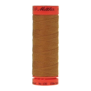 Mettler Metrosene 100% Polyester Cotton #1130 Palomino from Gabriele's Sewing & Crafts is a durable fine sewing thread that sews delicate silks to tough denim.