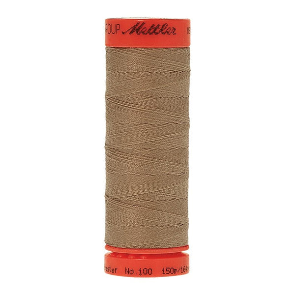 Mettler Metrosene 100% Polyester Cotton #1222 Sandstone from Gabriele's Sewing & Crafts is a durable fine sewing thread that sews delicate silks to tough denim.