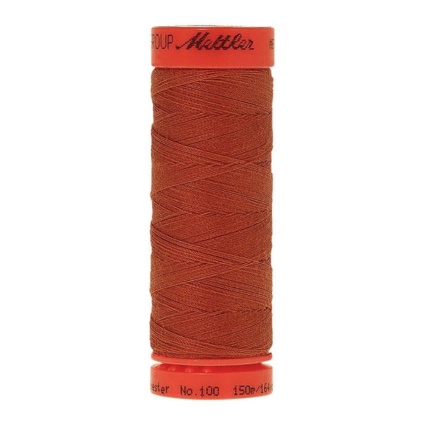 Mettler Metrosene 100% Polyester Cotton #1288 Reddish Ochre from Gabriele's Sewing & Crafts is a durable fine sewing thread that sews delicate silks to tough denim.