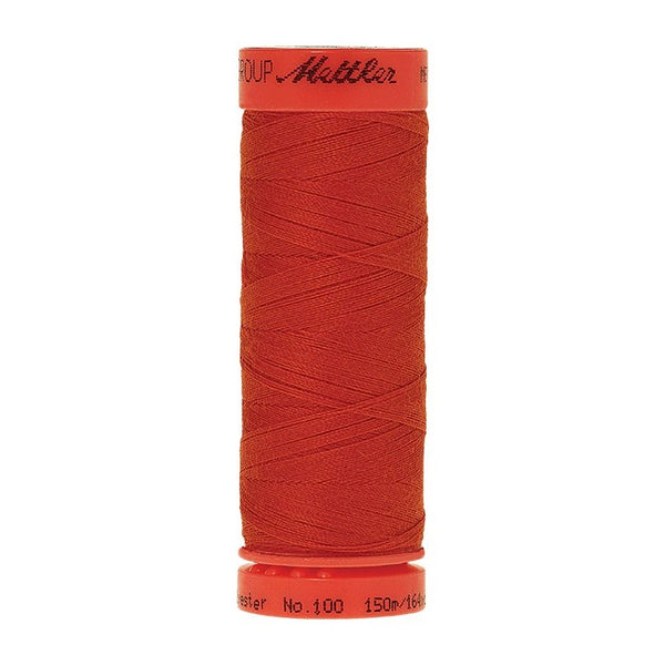 Mettler Metrosene 100% Polyester Cotton #0450 Paprika from Gabriele's Sewing & Crafts is a durable fine sewing thread that sews delicate silks to tough denim.