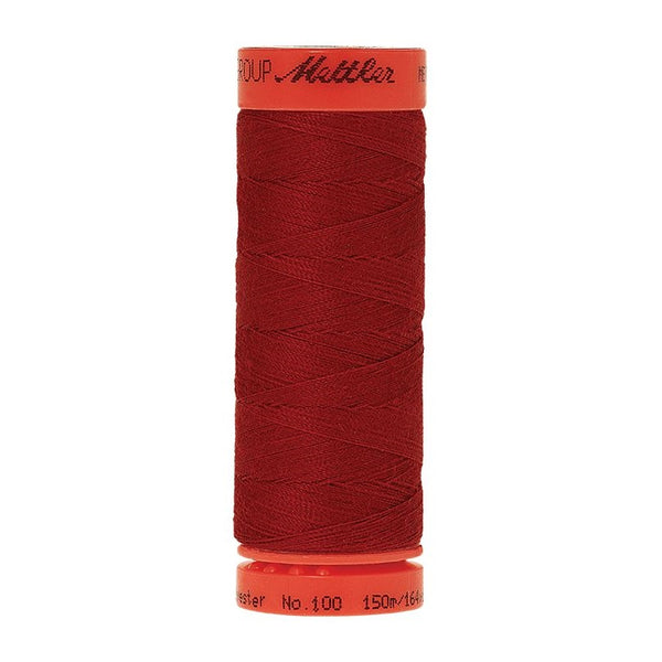 Mettler Metrosene 100% Polyester Cotton #0504 Country Red from Gabriele's Sewing & Crafts is a durable fine sewing thread that sews delicate silks to tough denim.