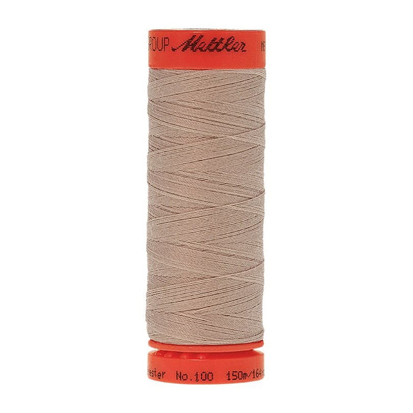 Mettler Metrosene 100% Polyester Cotton #0537 Oat Flakes from Gabriele's Sewing & Crafts is a durable fine sewing thread that sews delicate silks to tough denim.