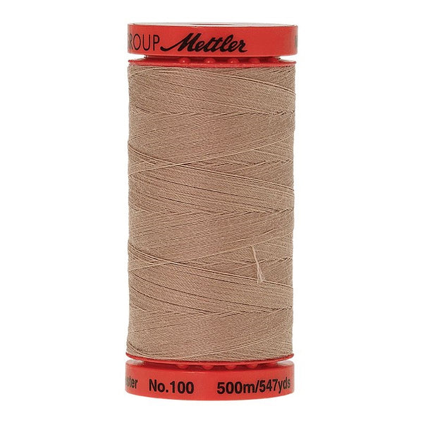Mettler Metrosene 100% Polyester Cotton #0538 Straw from Gabriele's Sewing & Crafts is a durable fine sewing thread that sews delicate silks to tough denim.