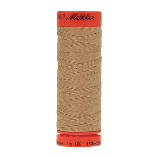 Mettler Metrosene 100% Polyester Cotton #0538 Straw from Gabriele's Sewing & Crafts is a durable fine sewing thread that sews delicate silks to tough denim.