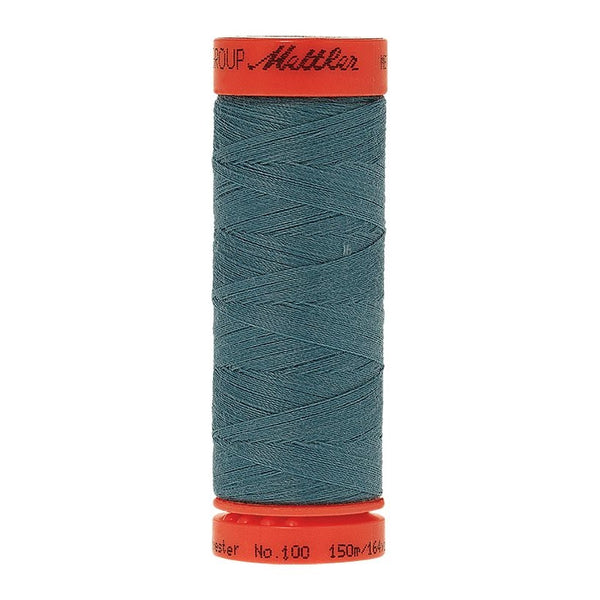 Mettler Metrosene 100% Polyester Cotton #0611 Blue-Green Opal from Gabriele's Sewing & Crafts is a durable fine sewing thread that sews delicate silks to tough denim.