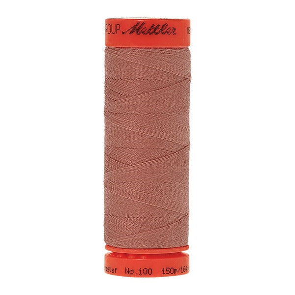 Mettler Metrosene 100% Polyester Cotton #0637 Antique Pink from Gabriele's Sewing & Crafts is a durable fine sewing thread that sews delicate silks to tough denim.