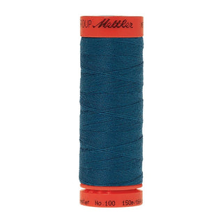 Mettler Metrosene 100% Polyester Cotton #0692 Dark Teal from Gabriele's Sewing & Crafts is a durable fine sewing thread that sews delicate silks to tough denim.