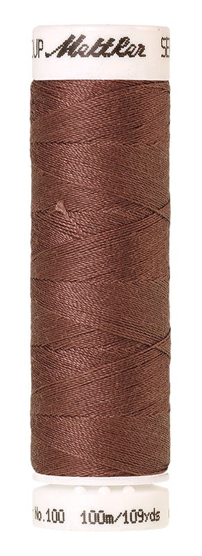 Mettler Seralon 100% Polyester Thread Shade 0296 Rusty Rose available from Gabriele's Sewing & Crafts
