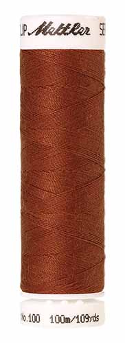 Mettler Seralon 100% Polyester Thread Shade 1054 Brick Red available from Gabriele's Sewing & Crafts